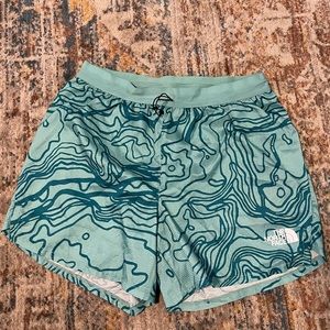 The North Face Men’s Sunriser short with brief liner inside.